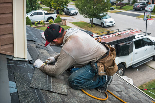 Professional Storm Damage Roof Repair technician working in Midland, NC
